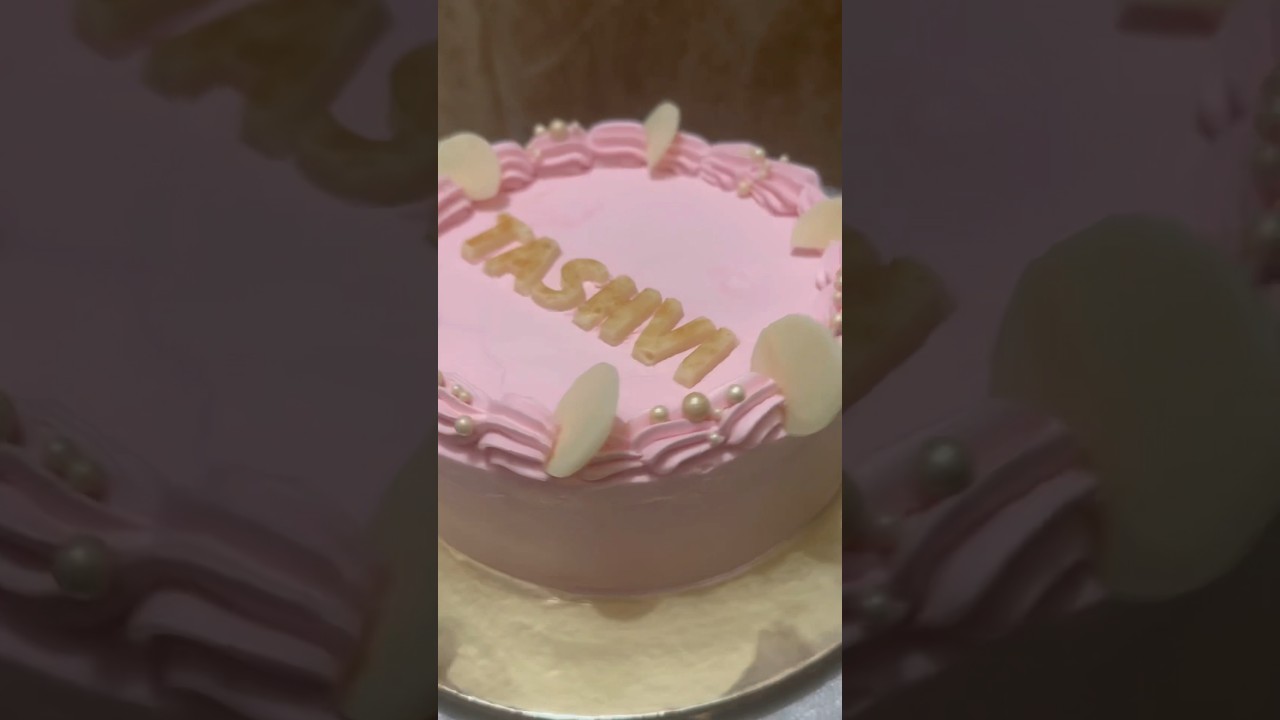 Pastel pink cake all dressed up for a girl’s birthday party